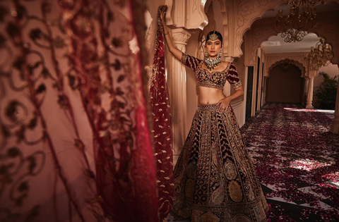 Red heavily embroidered lehenga