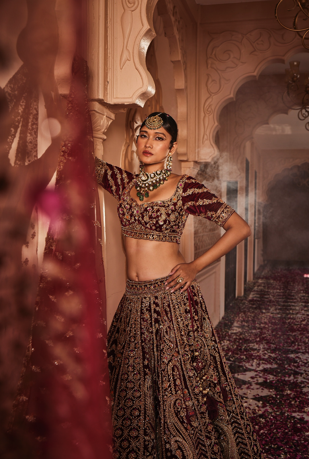 Red heavily embroidered lehenga