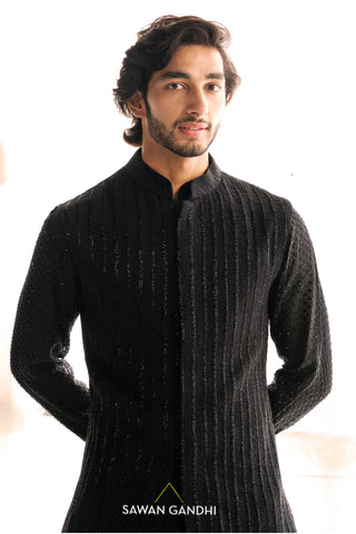 Black cutdana nehru paired with black swarovski kurta