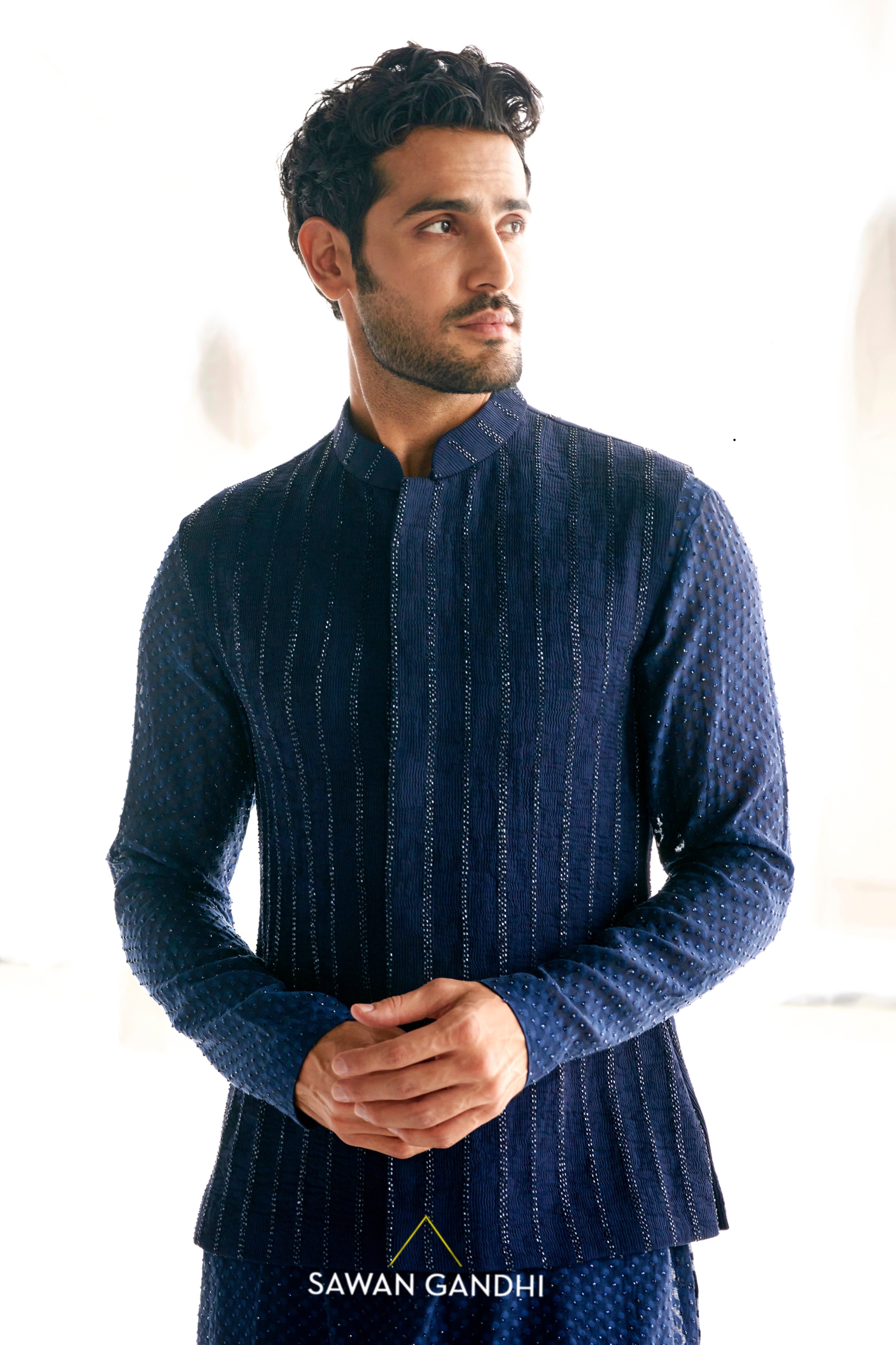 Blue cutdana nehru paired with blue swarovski kurta