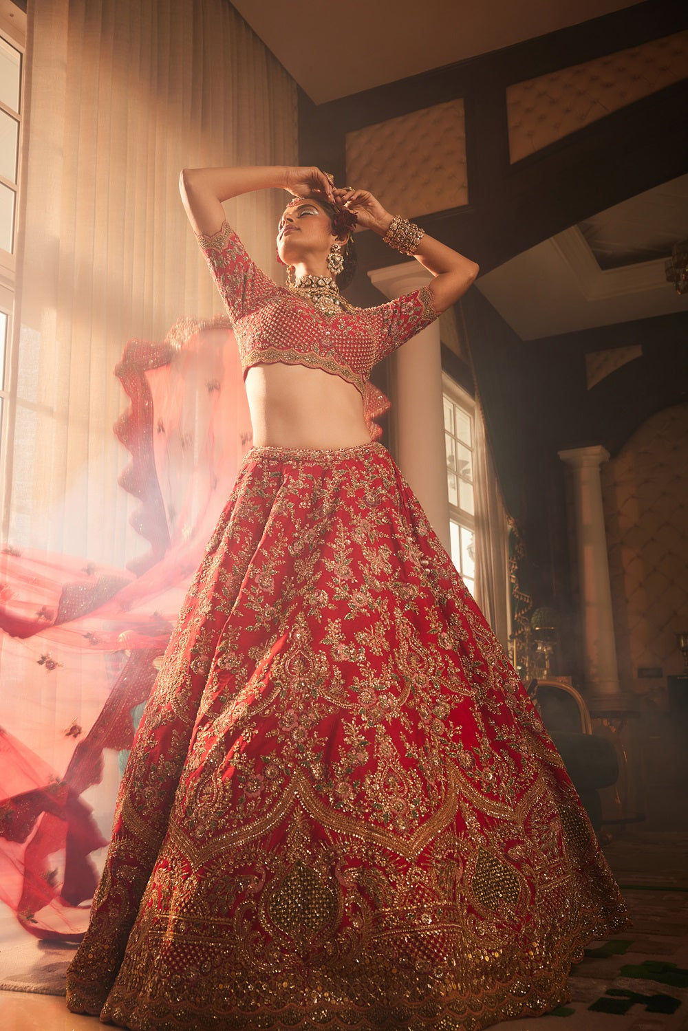 Red heavily embroidered lehenga