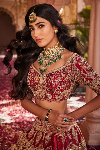 Red heavily embroidered lehenga