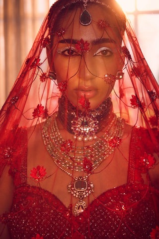 Red heavily embroidered lehenga