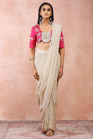 Hot pink embroidered choli with silver organza crushed tissue saree.