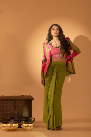 A multi color embroidered jacket set paired with bustier and drape skirt