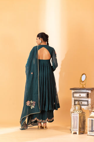 A teal green hand embroidered anarkali set with pants and duptta