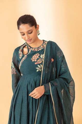 A teal green hand embroidered anarkali set with pants and duptta