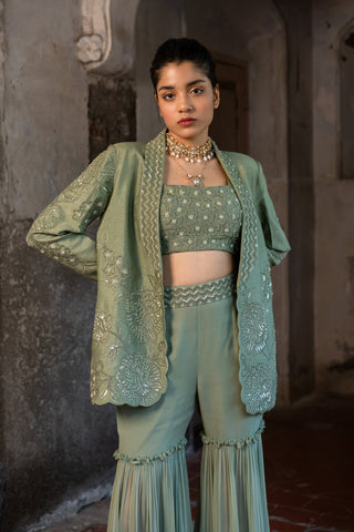 A embroidered blazer set with bustier and sharara pants