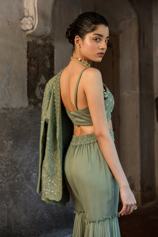 A embroidered blazer set with bustier and sharara pants