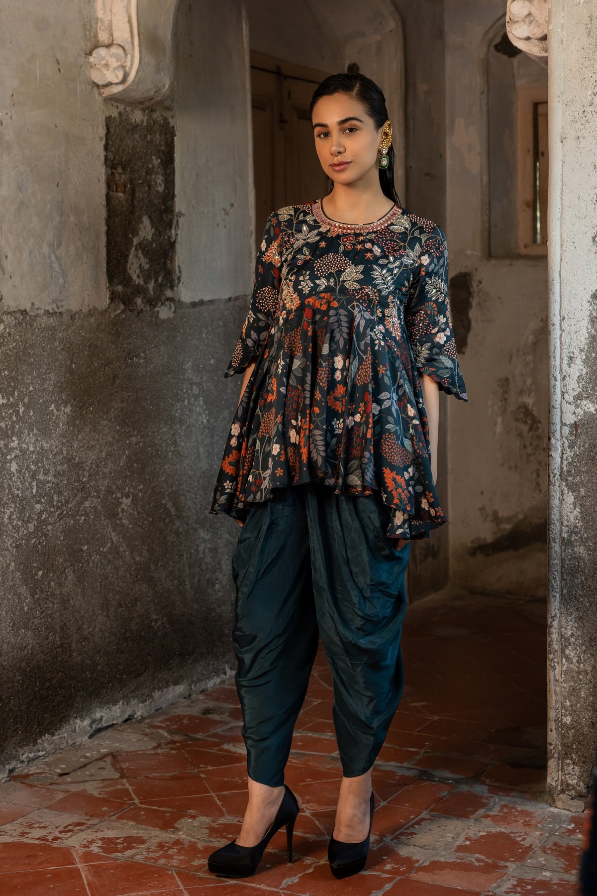 A printed peplum paired with dhoti pants