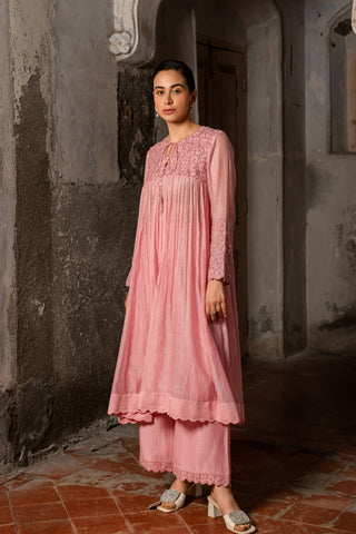 A baby pink kurta set with pants