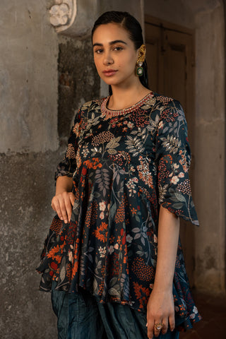 A printed peplum paired with dhoti pants