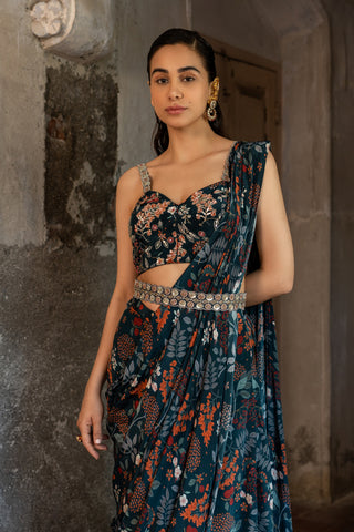 A draped indo western saree set paired with bustier and style with belt