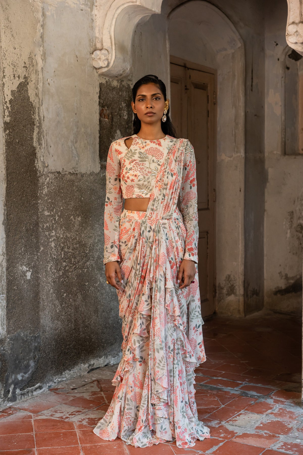 Ivory printed ruffle saree with hand embellished blouse