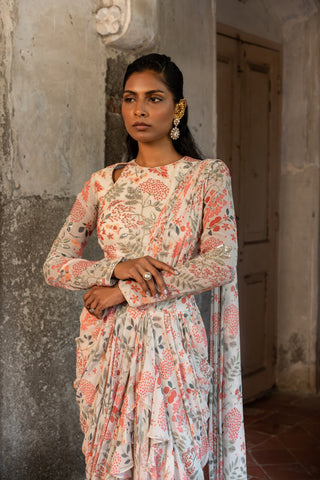 Ivory printed ruffle saree with hand embellished blouse