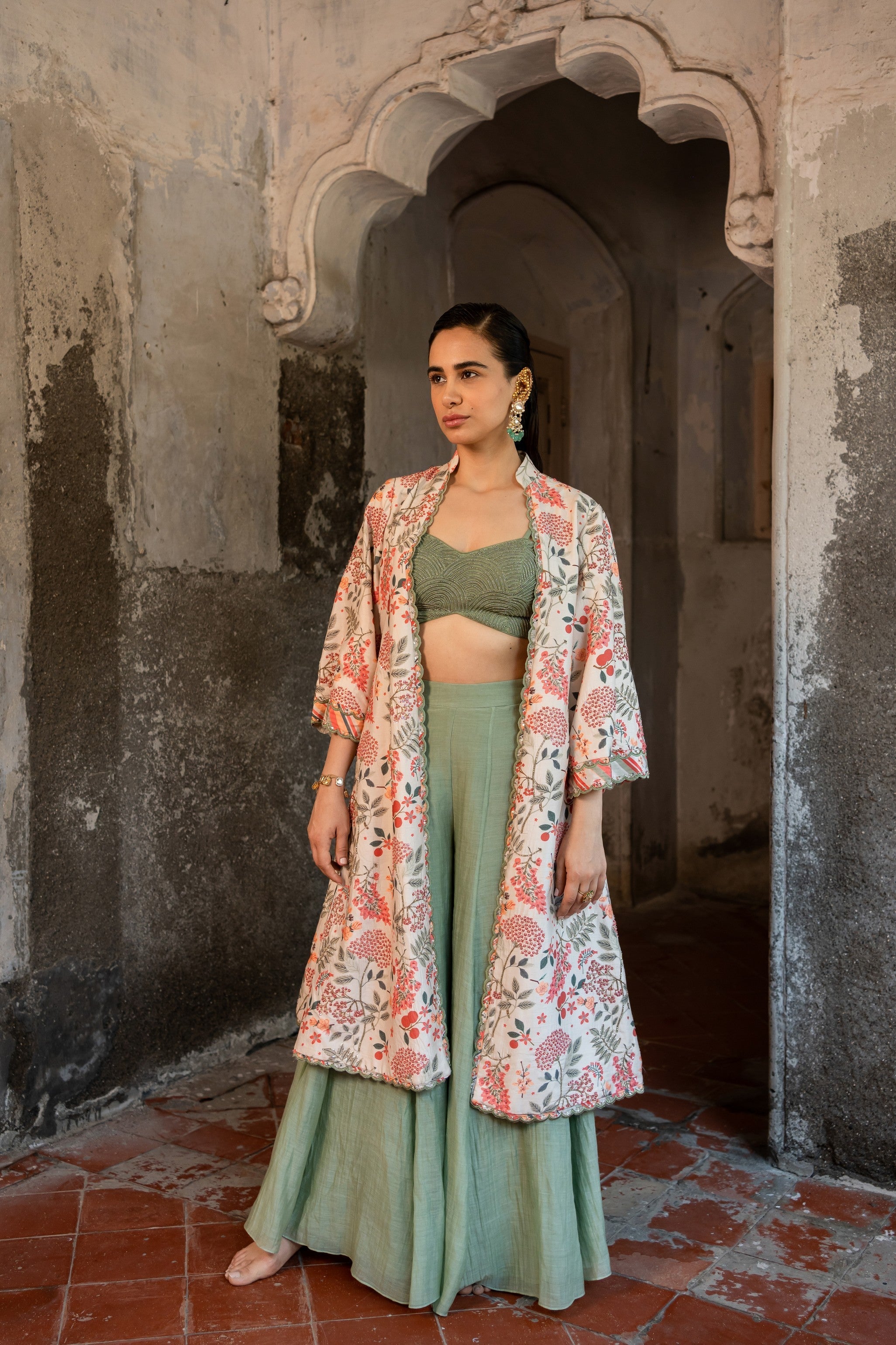 Floral printed jacket set with bustier and plazzo pants.