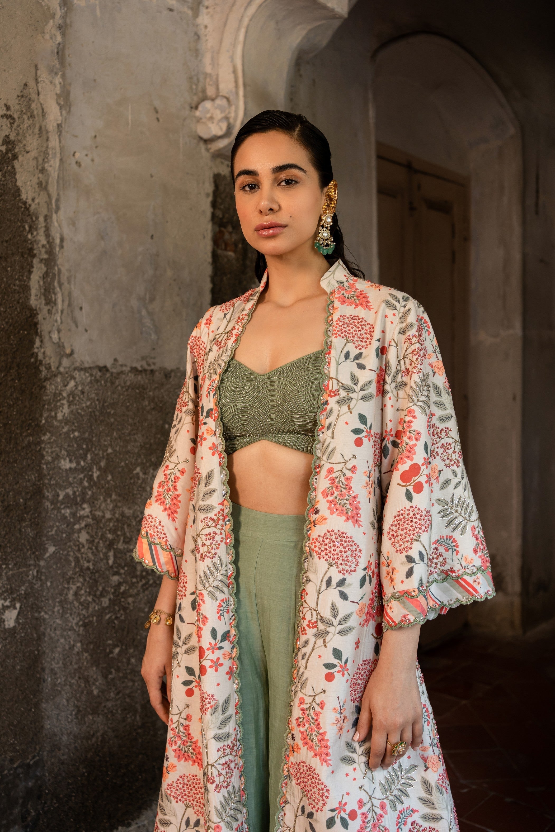 Floral printed jacket set with bustier and plazzo pants.