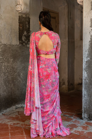 A hand embroidered pre-draped ruffle saree and blouse