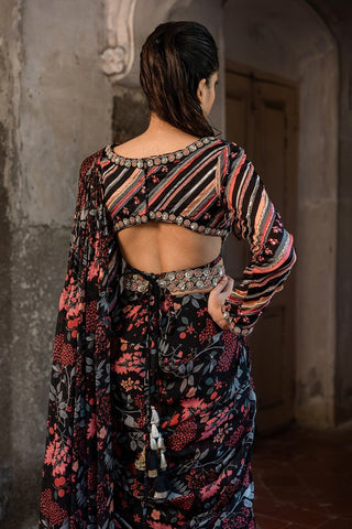 A pre-draped layer saree with hand embroidered blouse and belt