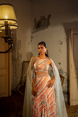 A hand embroidered lehenga set paired with blouse and duptta