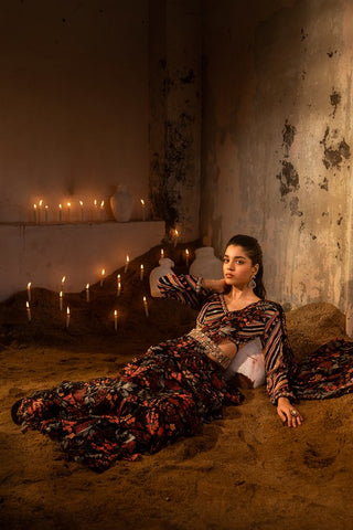 A pre-draped layer saree with hand embroidered blouse and belt