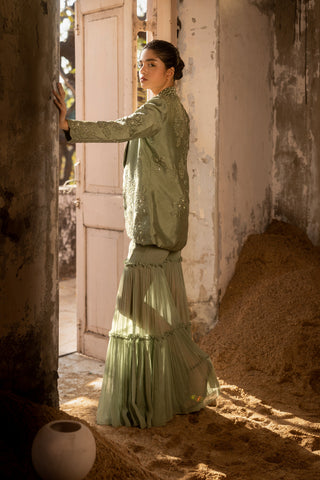 A embroidered blazer set with bustier and sharara pants