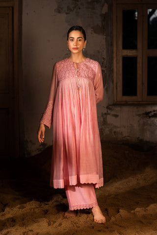 A baby pink kurta set with pants