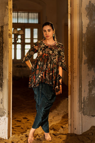 A printed peplum paired with dhoti pants