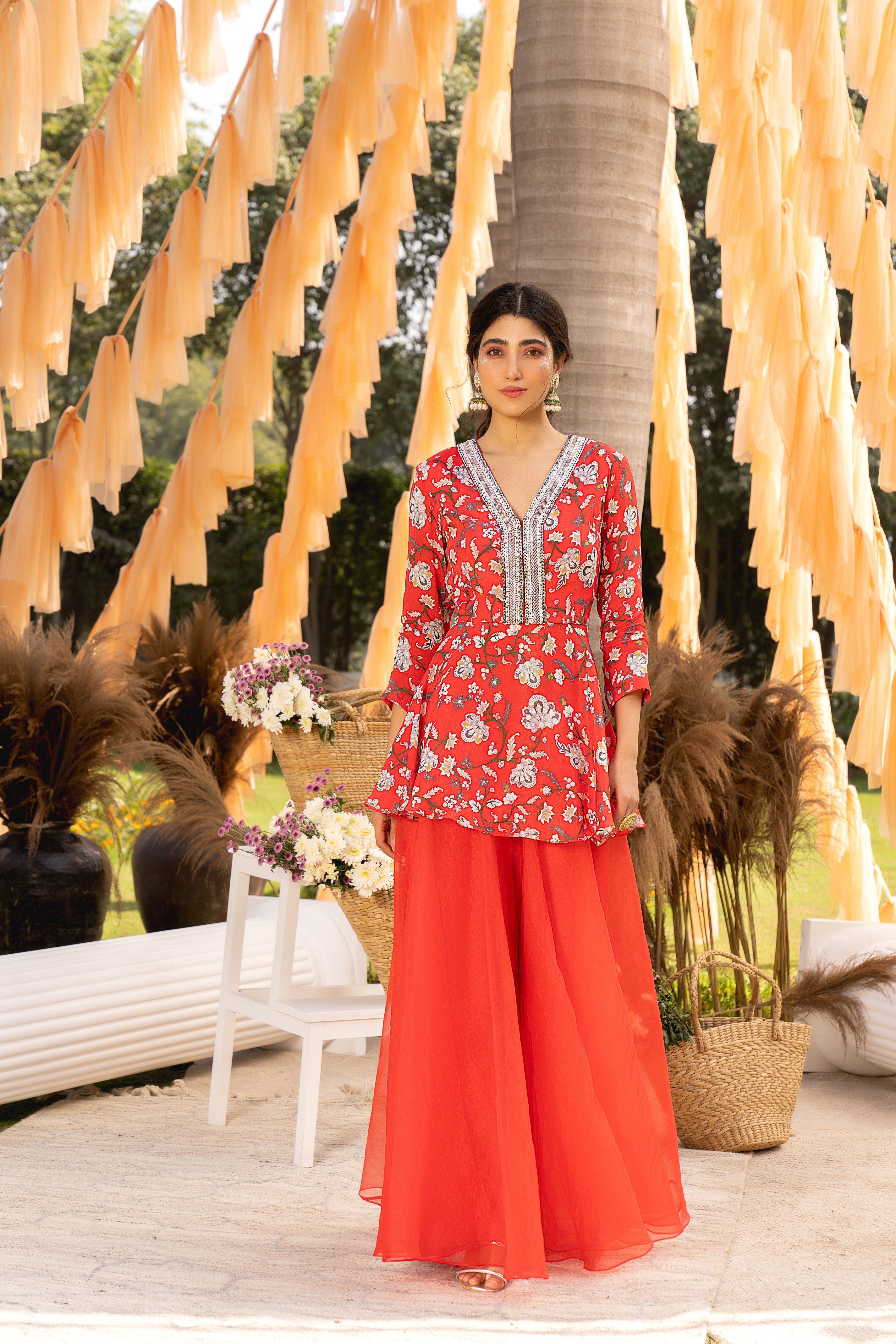 Red printed peplum top with organza skirt