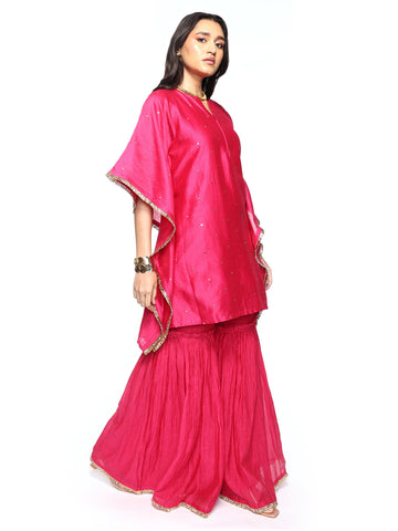 Short kaftan paired with garara pants