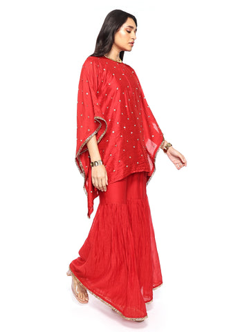 Short kaftan paired with garara pants