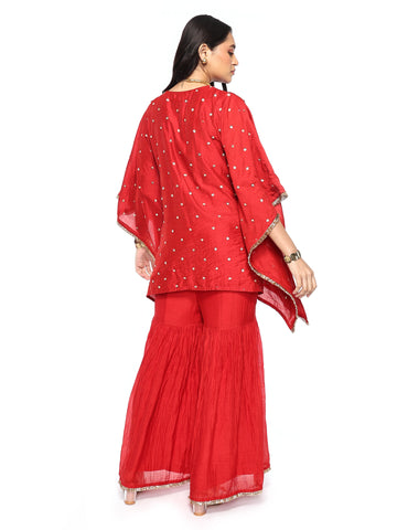 Short kaftan paired with garara pants