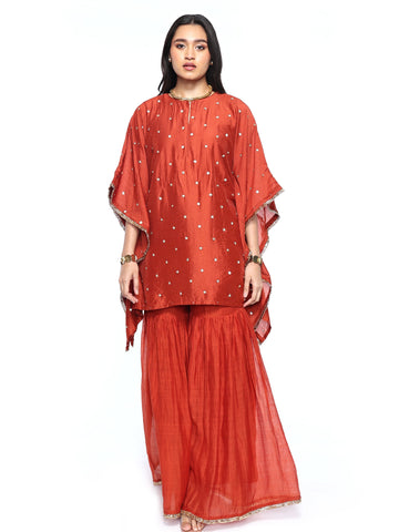 Short kaftan paired with garara pants