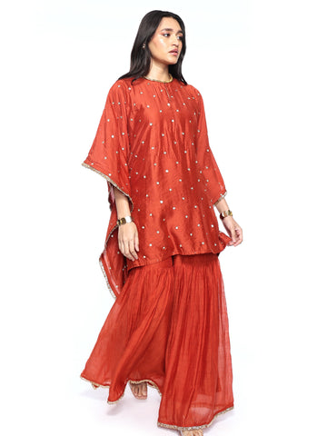 Short kaftan paired with garara pants